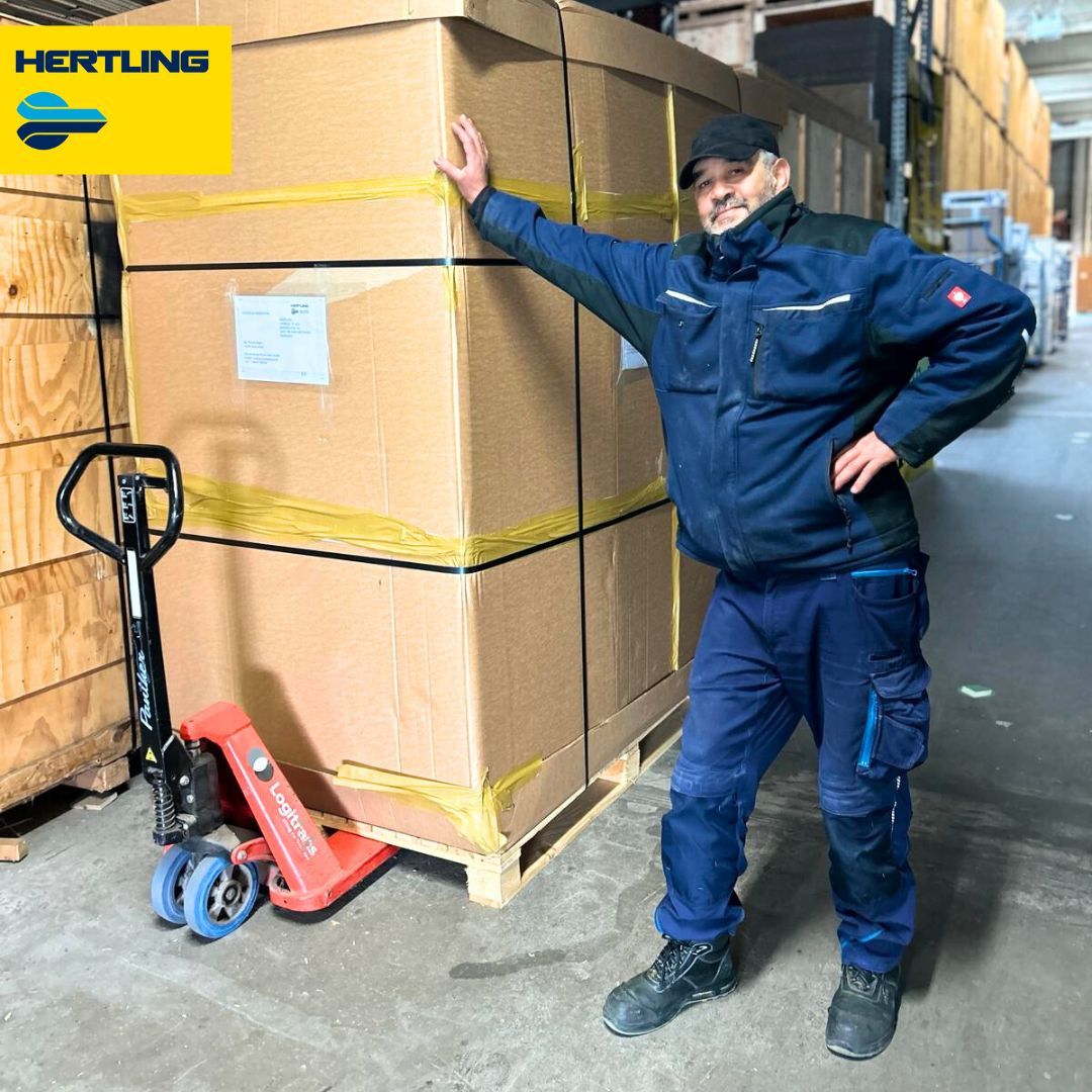 Hertling employee loading oversea freight